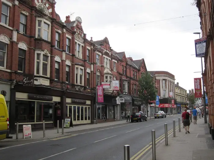 Red-brick Victorian shop parades along Stamford New Road, Altrincham