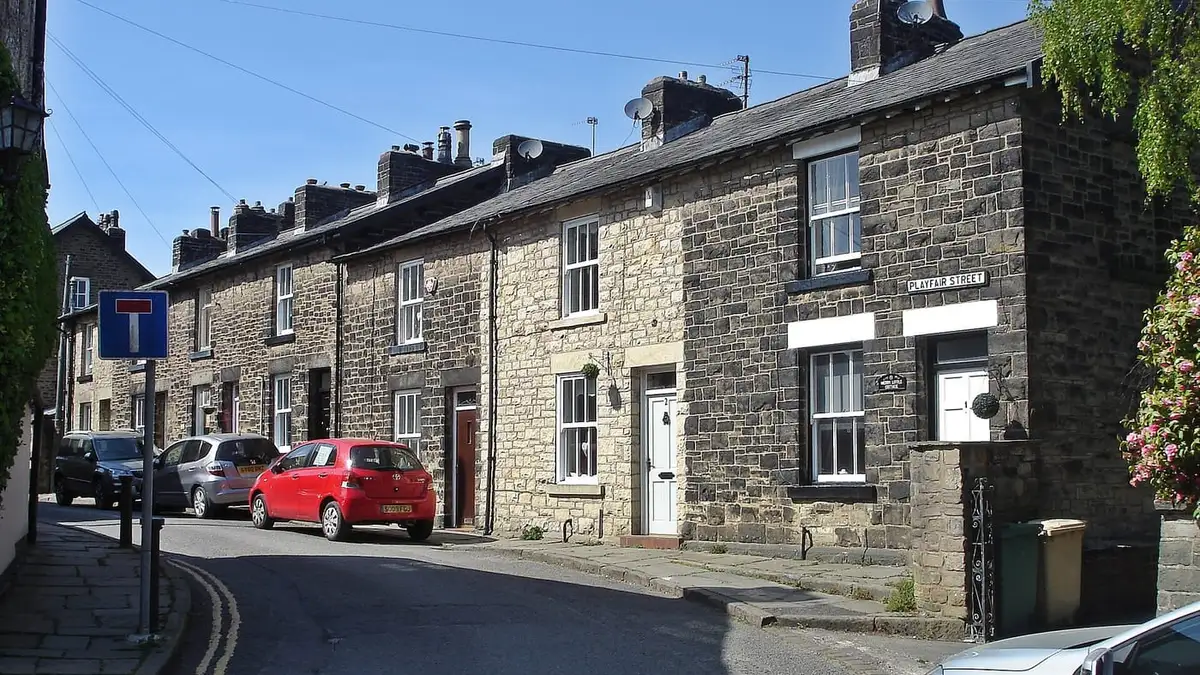 Row of stone terraced houses on Playfair Street, Bolton