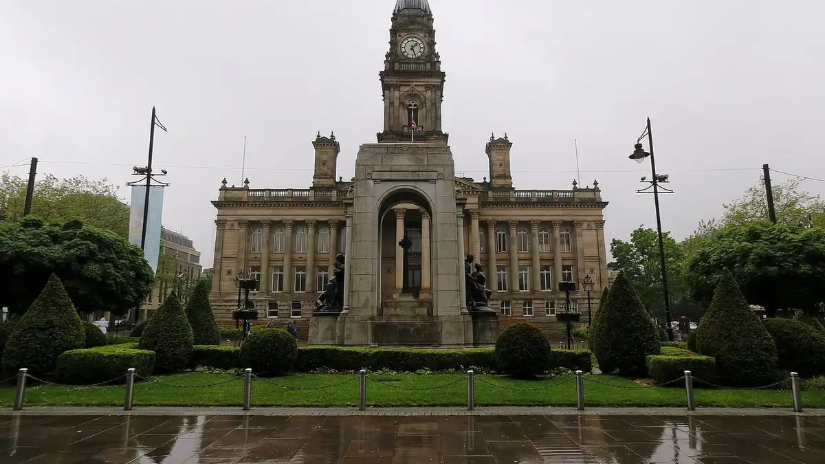 Bolton Town Hall and the war memorial seen across Victoria Square, Bolton