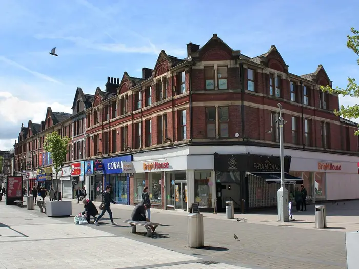 Victorian red-brick shops on The Rock, the main shopping street in Bury