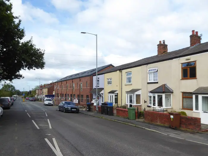 Terraced houses along Buxton Road (A6), Hazel Grove
