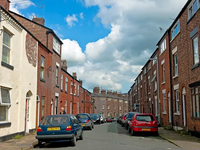 Brick terraced houses lining Paradise Street, Macclesfield