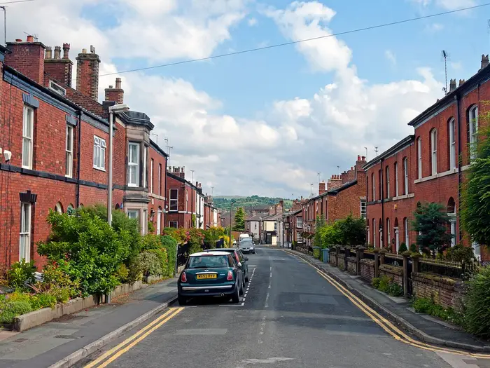 Victorian brick terraces with bay windows on Prestbury Road, Macclesfield