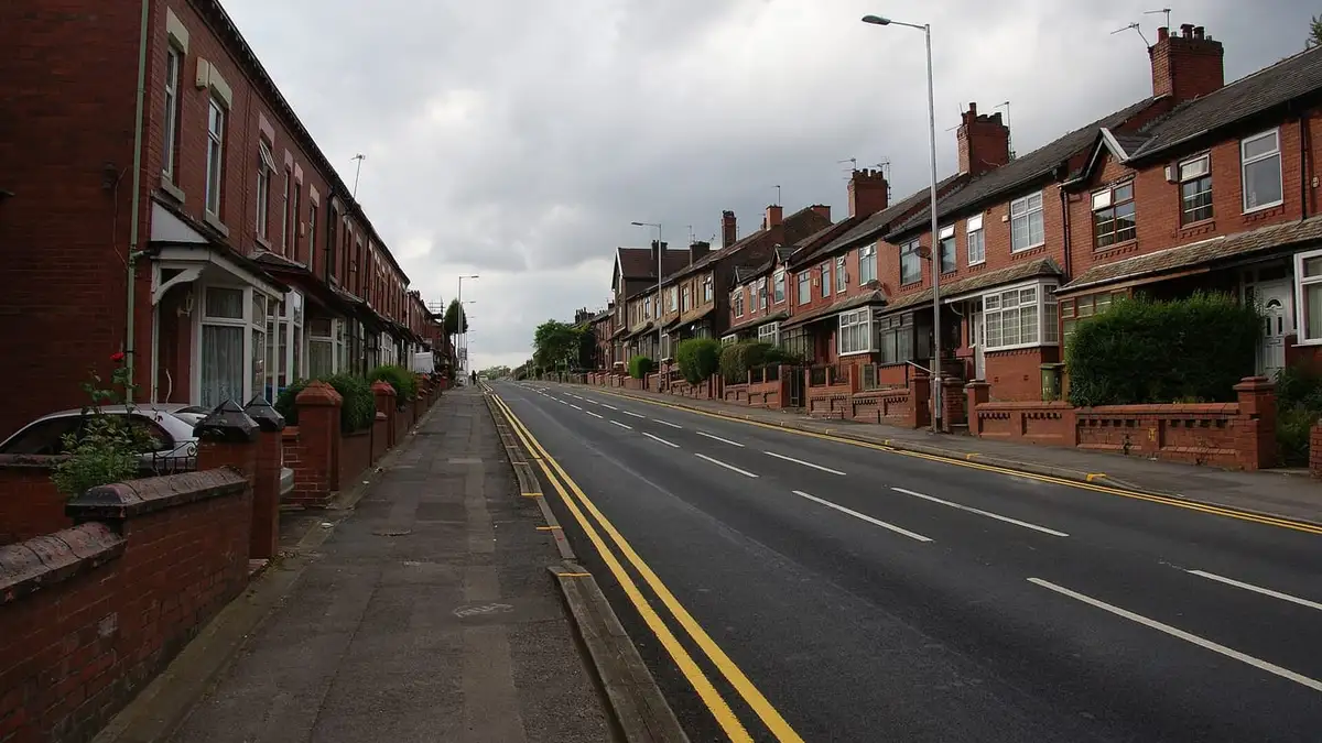 Terraced houses with front gardens on Abbey Hills Road, Oldham