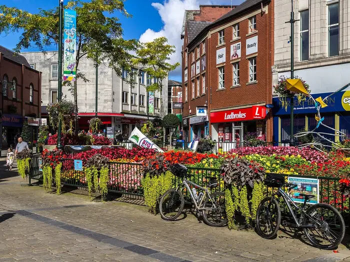 Flower displays and shops in Oldham town centre