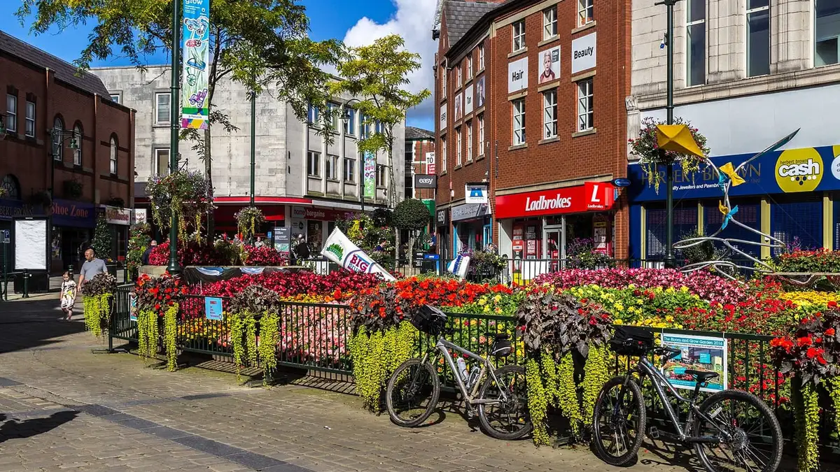 Flower displays and shops in Oldham town centre