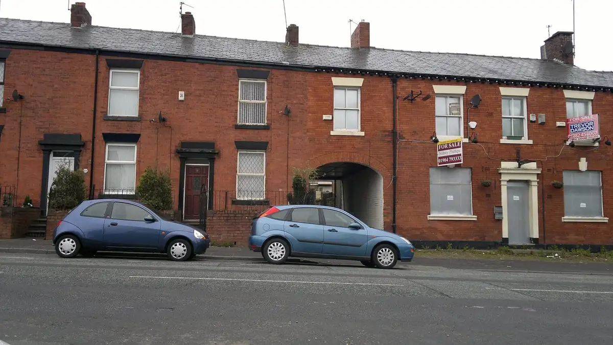 Red-brick terraced houses on Oldham Road, Rochdale