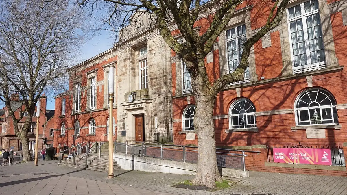 Sale Town Hall, a red-brick and stone civic building on School Road, Sale
