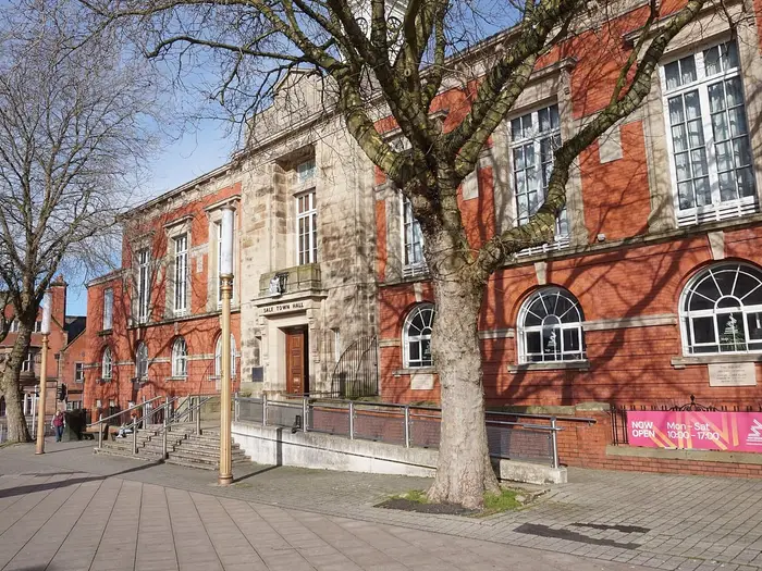 Sale Town Hall, a red-brick and stone civic building on School Road, Sale