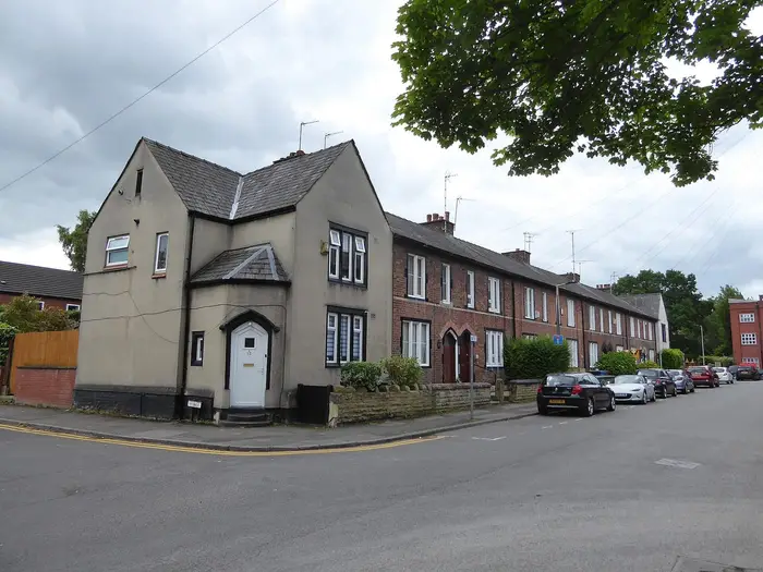 Victorian red-brick terraced houses on a street corner in Heaviley, Stockport