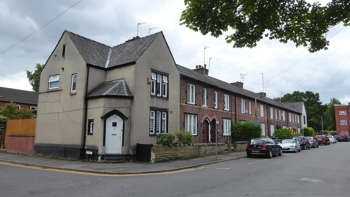 Victorian red-brick terraced houses on a street corner in Heaviley, Stockport