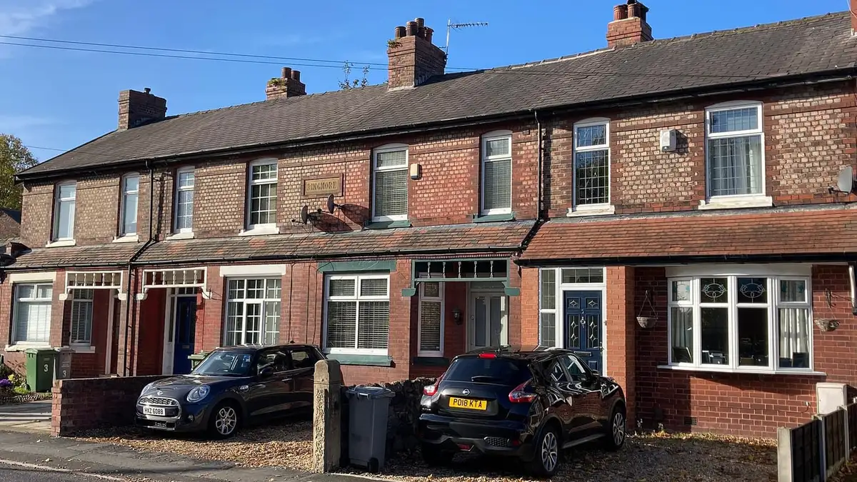 Brick terraced houses of Ringmore on Brook Road, Urmston