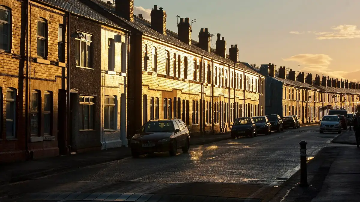 Late sun on a terrace of houses and rooftops on Algernon Street, Warrington