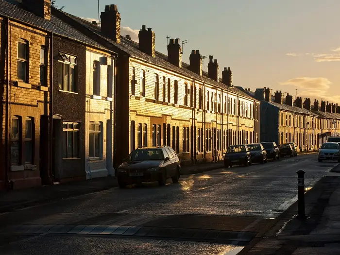 Late sun on a terrace of houses and rooftops on Algernon Street, Warrington
